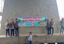 Spanduk Larangan Berenang Dipasang, Lurah Himbau Warga Lebih Waspada